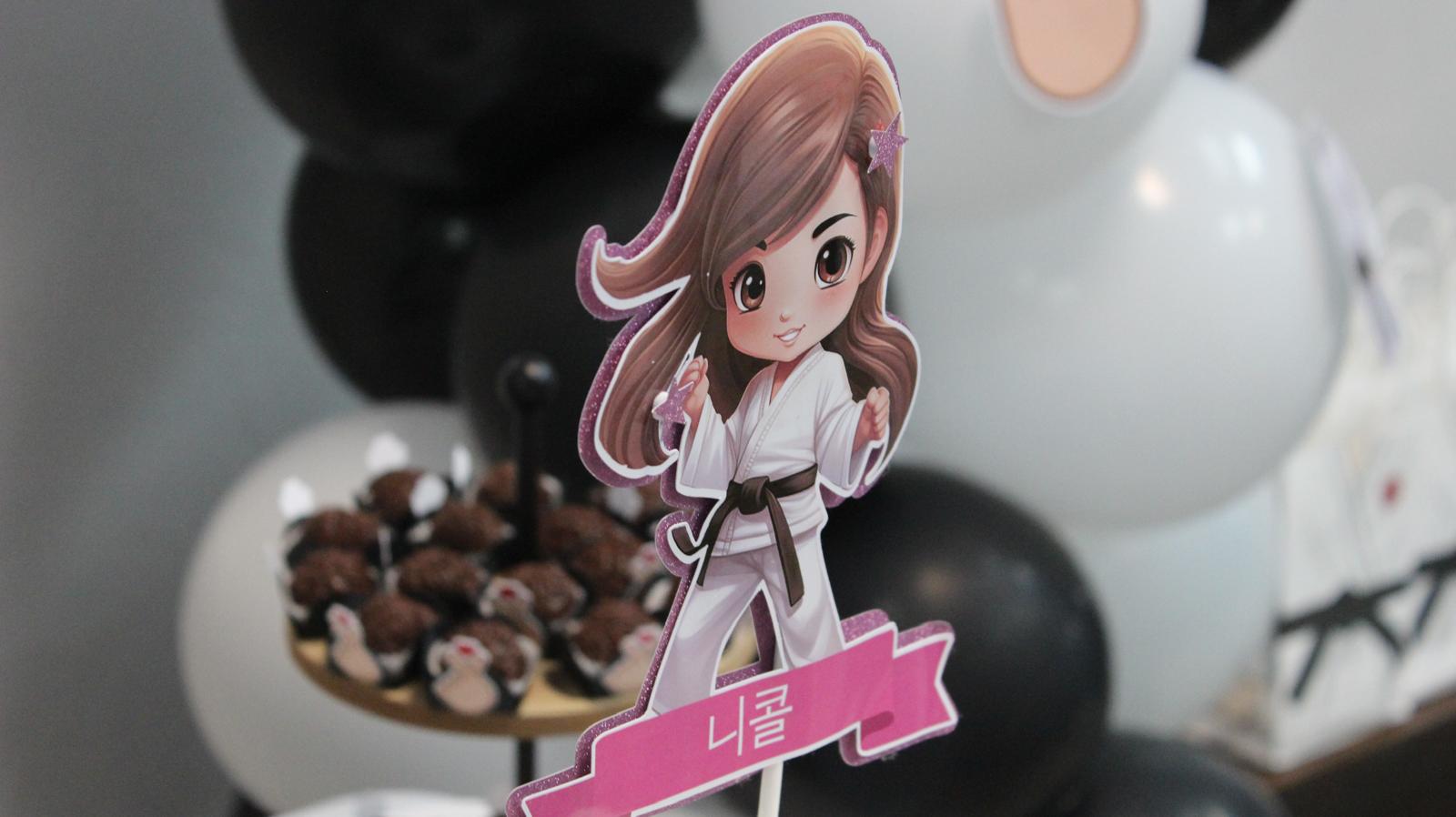 Custom karate-themed cake topper with personalized name banner for kids martial arts birthday